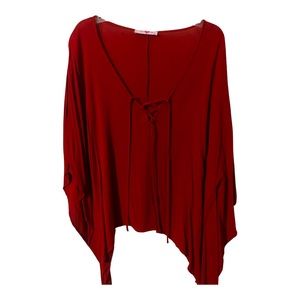 Red lace up, loose fitting, flowy top by Buddy Love